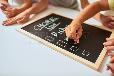 Buy stock photo Hands, writing and chalkboard for chores, list and children for teaching, help or development in family house. People, blackboard or notes for dishes, schedule or planning for cleaning with hygiene