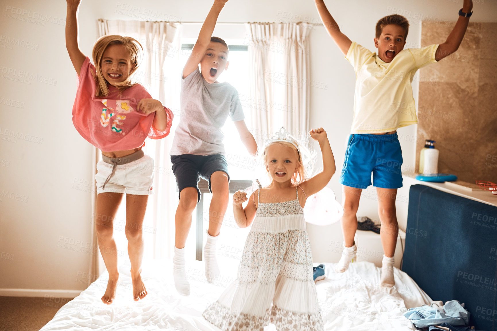 Buy stock photo Portrait, children and jump for fun on bed with energy, freedom and family bonding of connection together. Kids, playful and bounce game with love, care and support of development growth at house