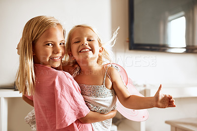 Buy stock photo Carry, happy and portrait of girls in home or fairy costume for dress up, fantasy fun or tiara with smile. Family siblings, excited kids or sisters playing with wings or princess outfit for bonding