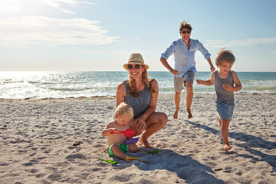 Buy stock photo Happy, parents and children playing on the beach on family travel, holiday or adventure in summer. Boy, father and kids with outdoor ocean for fun energy and happiness with a game while running