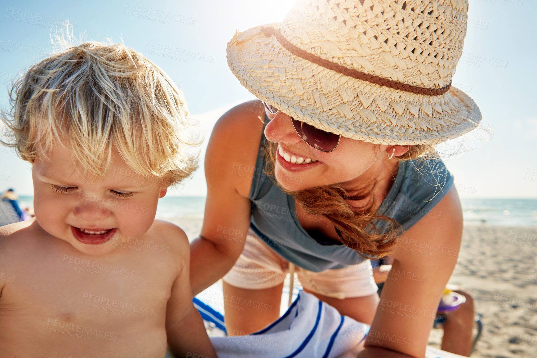 Buy stock photo Woman, support and child on beach in playing on holiday, vacation in Istanbul for happiness or memory. Excited, mom and kid for relax, together and bonding in summer for growth, development or love