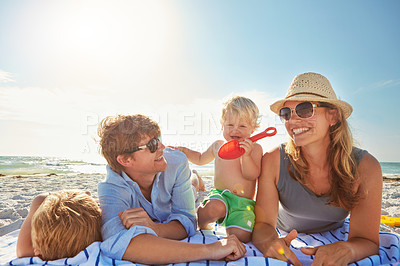 Buy stock photo Portrait, holiday or kids with parents at beach for vacation, love or happy family weekend together. Father, fun mother or children siblings at sea for bonding or playing in nature in Spain to relax