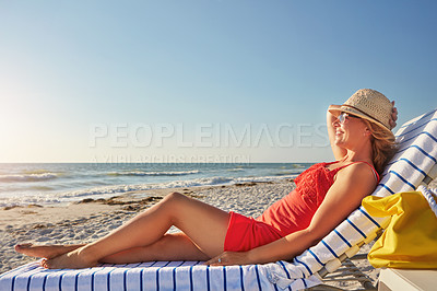 Buy stock photo Woman, smile and relax on chair at beach for tropical island, vacation and outdoor holiday in summer. Female person, hat and happy with sunglasses by ocean for sunshine, travel and tourism in Bali