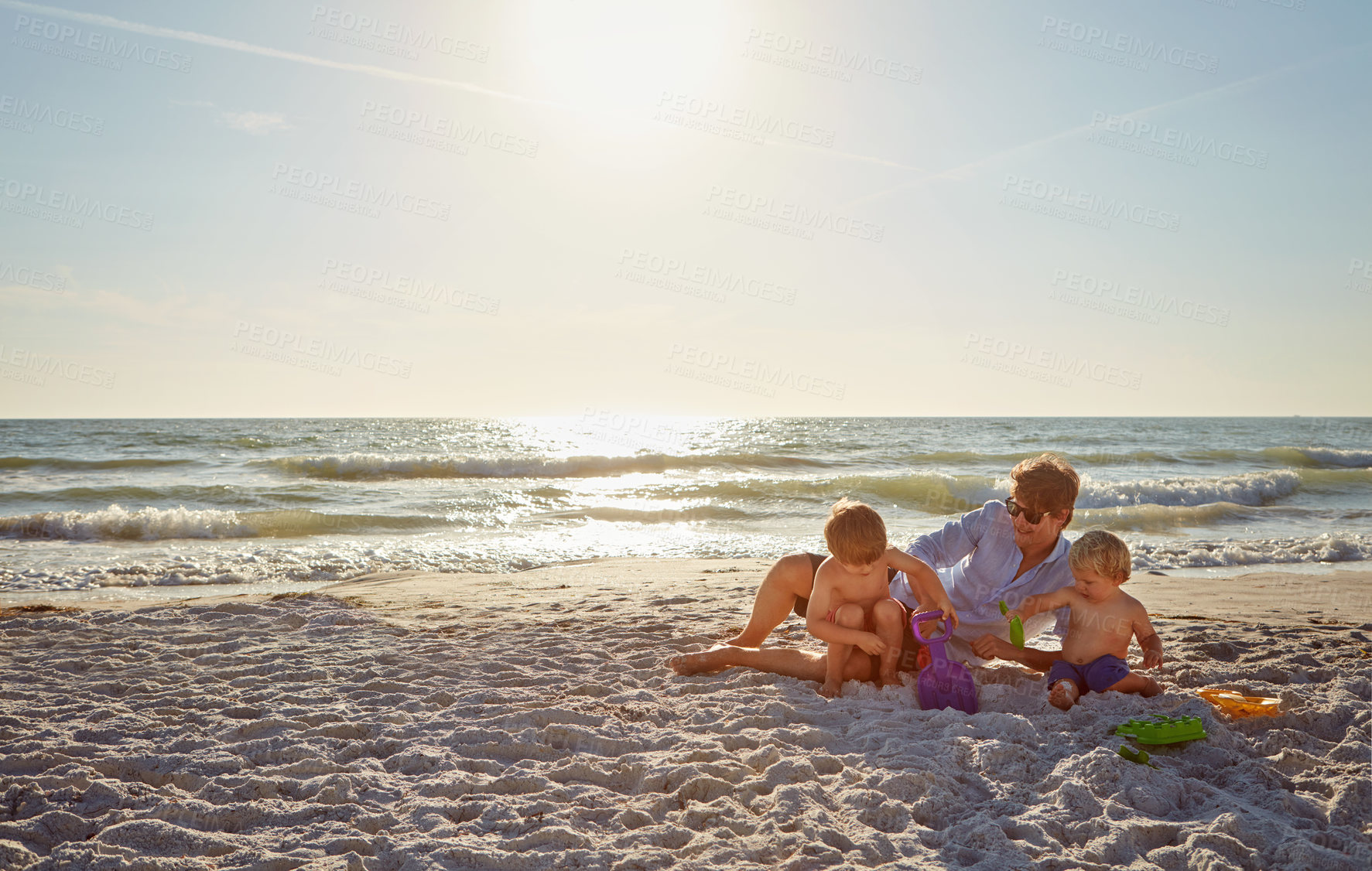 Buy stock photo Playing, relax or kids with father at beach on holiday vacation or happy family weekend together. Single parent, fun dad or children siblings at sea for bonding, love or wellness in nature in Spain