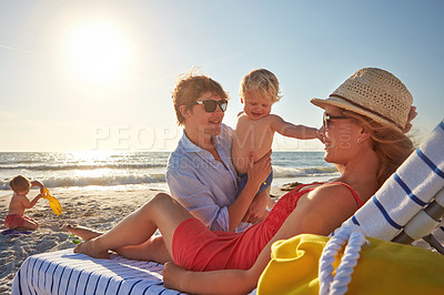 Buy stock photo Woman, man and kids on beach bed as family on holiday, vacation in Istanbul for happiness or memory. Excited, people and ocean for relax, together or bonding as parents in growth, development or play