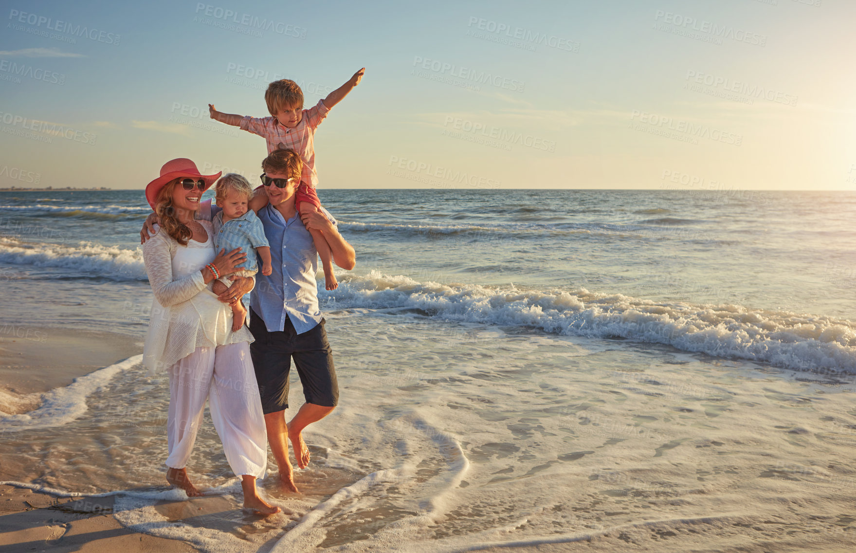 Buy stock photo Outdoor, holiday and fun for family, beach and bonding in trip, walking and summer in California. Sea, peace and children will parents, waves and water of ocean, couple and man with woman together