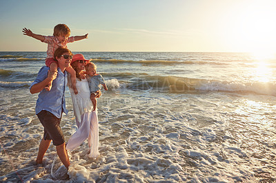 Buy stock photo Morning, holiday and walking for family, beach and bonding in trip, fun and outdoor in California. Sea, peace and children will parents, waves and water of ocean, couple and man with woman together