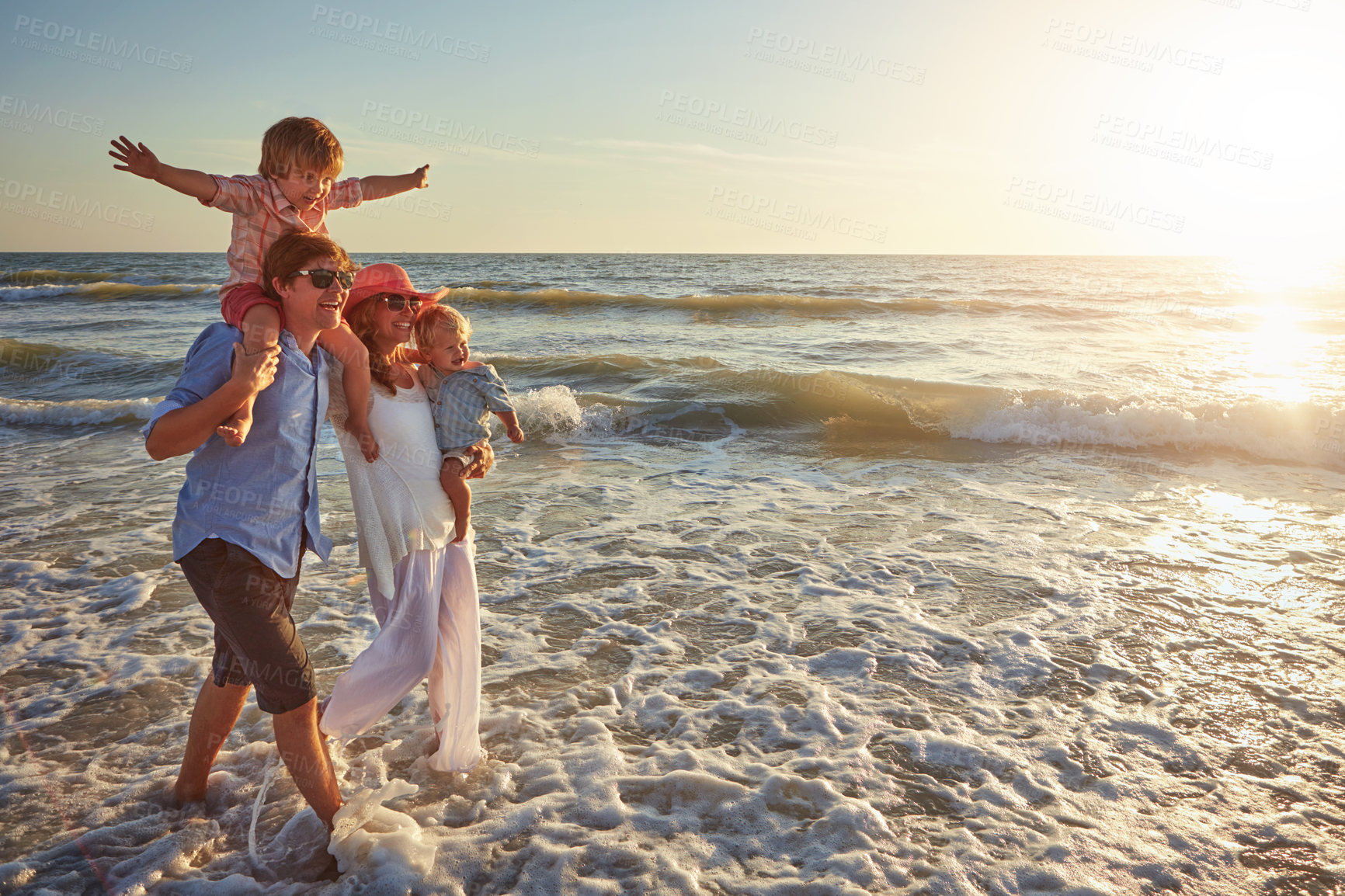 Buy stock photo Morning, holiday and walking for family, beach and bonding in trip, fun and outdoor in California. Sea, peace and children will parents, waves and water of ocean, couple and man with woman together