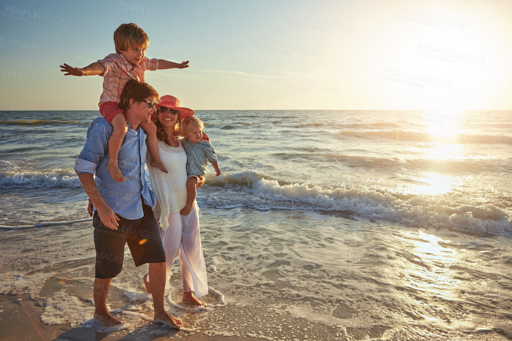 Buy stock photo Big family, beach holiday or walking, happiness for vacation on tropical island. Man, woman or children together with sunglasses by ocean for travel with wellness, mockup space at sunset in Mauritius