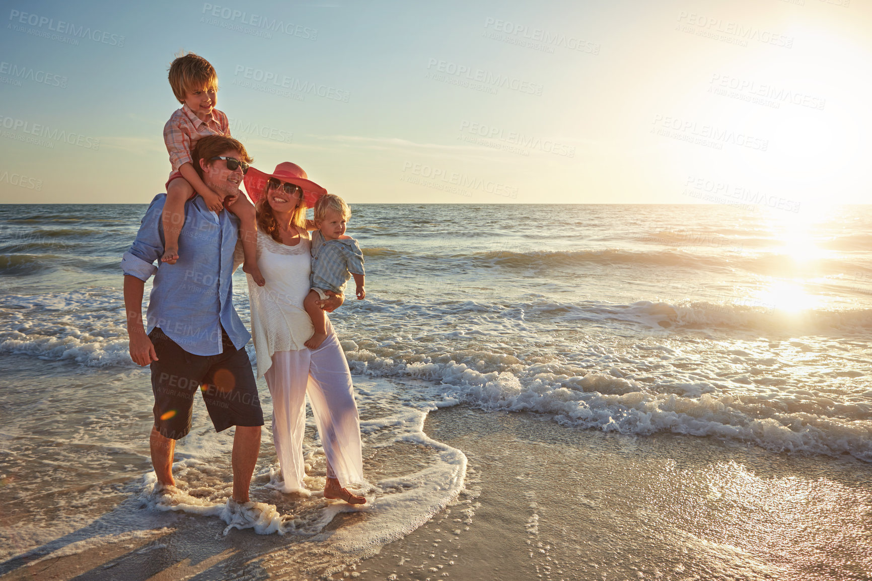 Buy stock photo Big family, beach holiday and love, happiness for vacation on tropical island. Man, woman and children together with sunshine by ocean for travel with wellness, waves and sunset walk in Mauritius