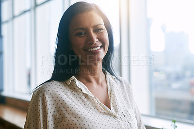Buy stock photo Portrait of a confident businesspeople standing at a window in an office