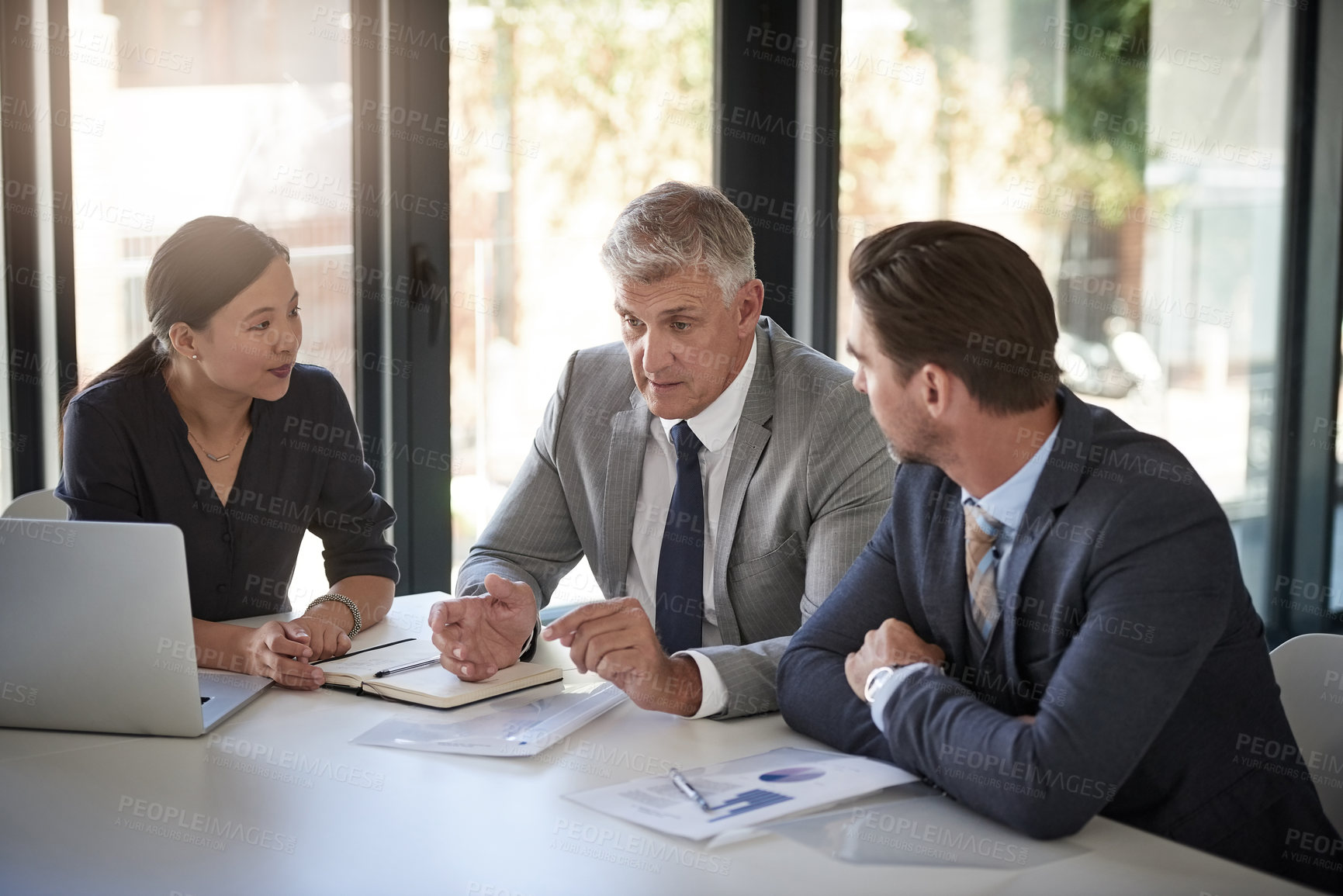 Buy stock photo Meeting, collaboration and workshop with a manager and team in the boardroom for a coaching seminar. Teamwork, strategy and planning with a mature CEO business man talking to his staff in the office