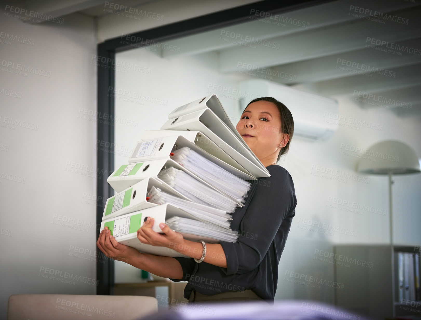 Buy stock photo Portrait, carry and businesswoman with heavy paperwork in administration career crisis or workload. Folder, binder and overwhelmed administrator with stack or pile of documents for deadline workplace