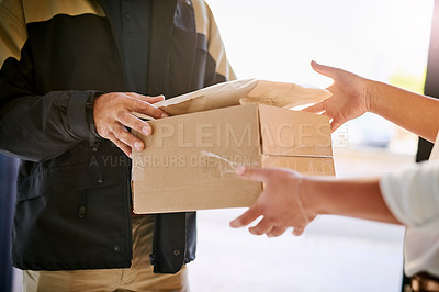Buy stock photo Customer, box and delivery man giving package at home from courier company. Logistics worker at front door of woman or client with a parcel in cardboard for e commerce shipping or mail distribution
