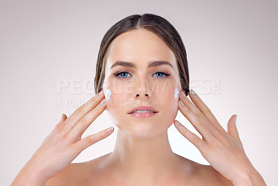 Buy stock photo Beauty, skincare and portrait of woman with cream for glow, wellness or hydration isolated on studio background. Cosmetics, face and model apply lotion product in spa for dermatology, health or shine