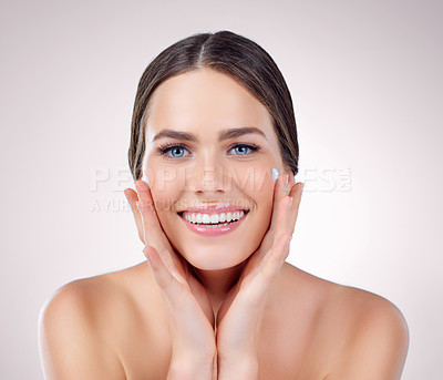 Buy stock photo Studio, skincare and face of woman, cream and results of treatment, hands and moisturizer for aesthetic. Pink background, portrait and proud of dermatology, shine and glow for person, soft and beauty