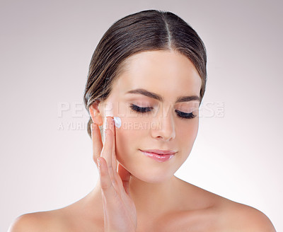 Buy stock photo Woman, creme and studio for moisturizing skincare, beauty and cosmetics lotion for even skin tone. Female person, dermatology and hydration glow on white background, sunscreen and apply ointment