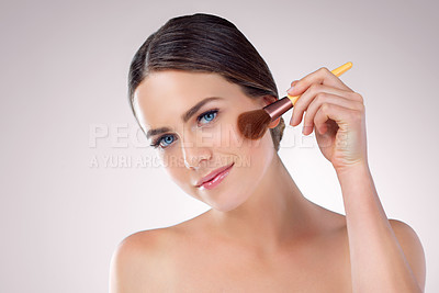 Buy stock photo Woman, brush and makeup in studio portrait, skincare and cosmetics tool for highlighter. Female model person, facial treatment and white background for beauty, foundation transformation and blush