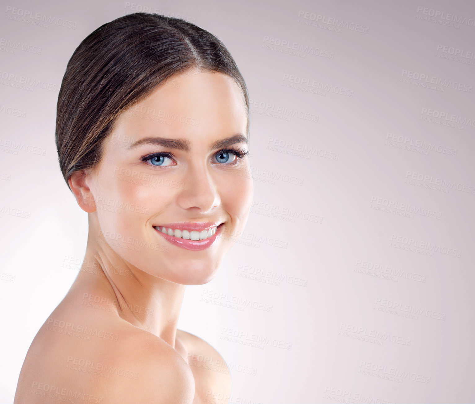 Buy stock photo Studio shot of an attractive woman posing against a grey background