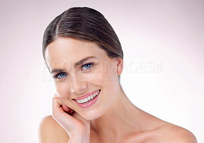 Buy stock photo Studio, skincare and face of woman, touch and results of treatment, hand and confidence of aesthetic. Pink background, portrait and proud of dermatology, shine and glow for person, soft and wellness