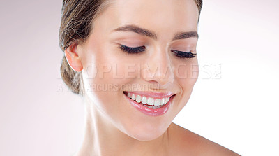 Buy stock photo Smile, lip gloss and face of woman with makeup, eyeshadow or wellness in white background in studio. Shine, smooth texture or happy model with glow, skincare cosmetics or beauty treatment results