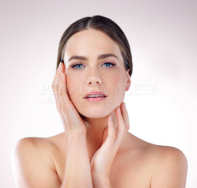 Buy stock photo Beauty, skincare and portrait of woman with makeup, glow or wellness isolated on studio background. Cosmetic, hands or confident model touch face in spa for dermatology, health or shine for aesthetic