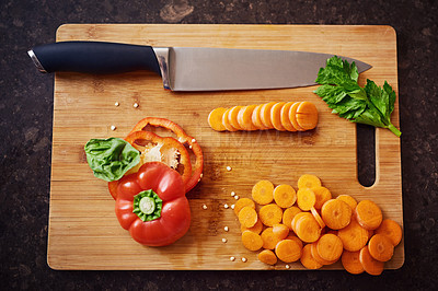 Buy stock photo High angle shot of freshly sliced ingredients on a chopping board