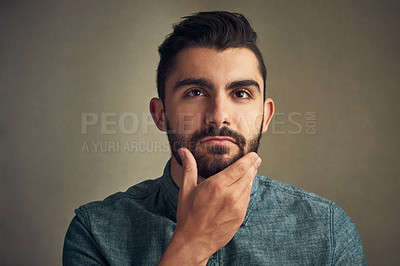 Buy stock photo Beard, man and thinking in studio for hair care, date preparation and daily routine. Male person, grooming or touch face on dark background with confidence, natural aesthetic and facial treatment