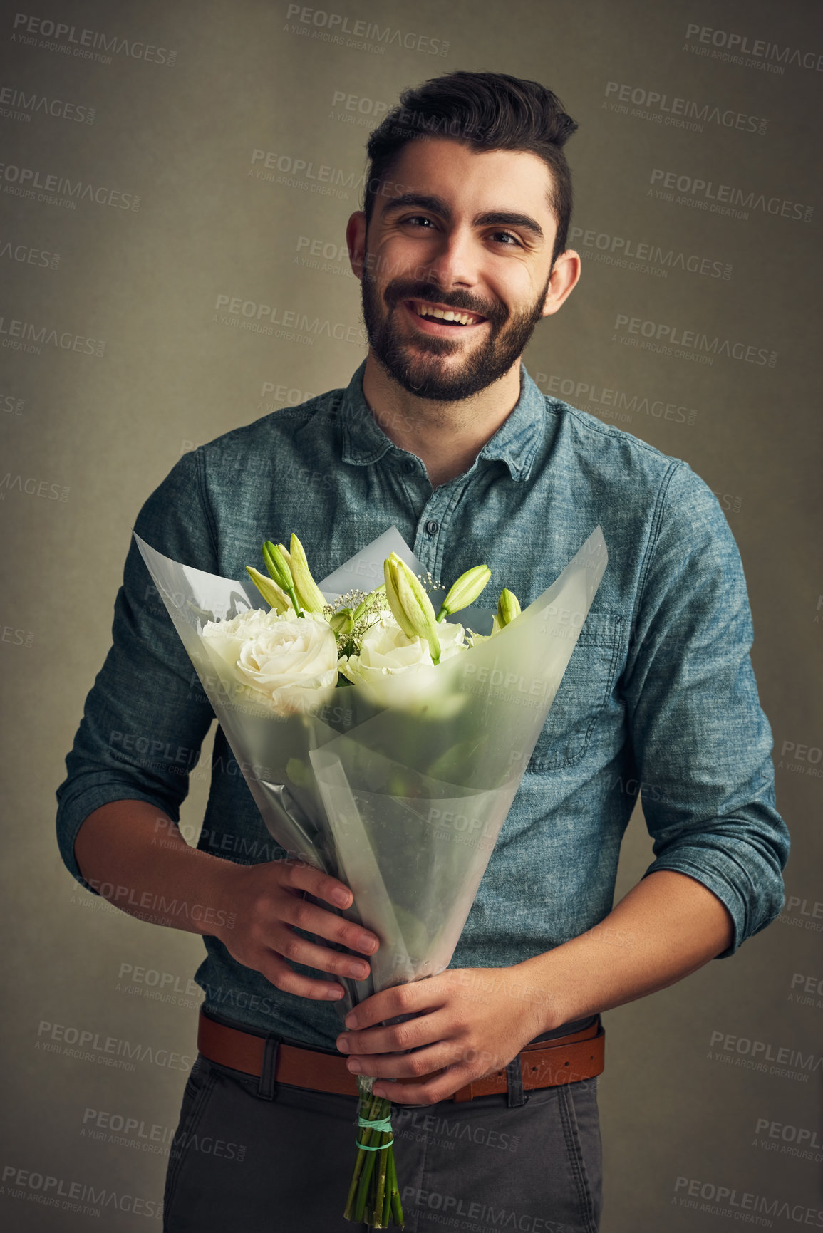 Buy stock photo Flowers, man or happy with gift on portrait for celebration, thank you or white roses for kindness. Person, face or smile with bouquet for anniversary, romance or support present on studio background