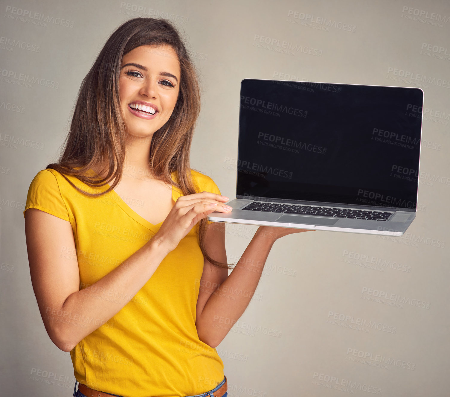 Buy stock photo Laptop, woman and portrait for advertising, smile for promotion and screen isolated in white background. Computer, girl model and wireless connection for technology, presentation and mockup in studio