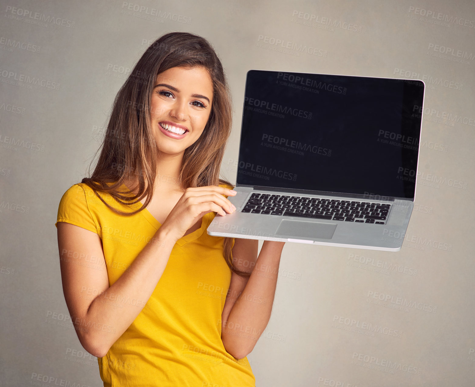 Buy stock photo Studio, smile and portrait of woman with laptop screen for website, connection and online news. Happy, person and tech with mockup space for freelance trading, registration or info on gray background