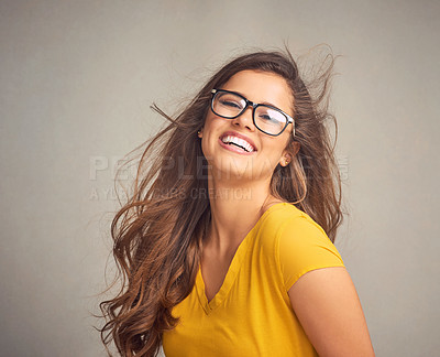 Buy stock photo Studio, smile and portrait of woman with glasses, confidence  and positive attitude in trendy fashion. Happy, face and girl in gen z style with pride, vision and eye care wellness on grey background