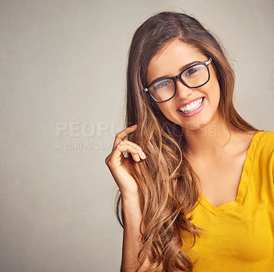 Buy stock photo Studio, student and portrait of woman with glasses, confidence and positive attitude in mockup space. Happy, face and girl in gen z style with pride, vision and eye care wellness on grey background