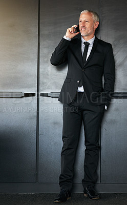 Buy stock photo Phone call, businessman and happy for communication, contact and network in office. A senior entrepreneur person on a grey wall with a cellphone for conversation and thinking about corporate idea