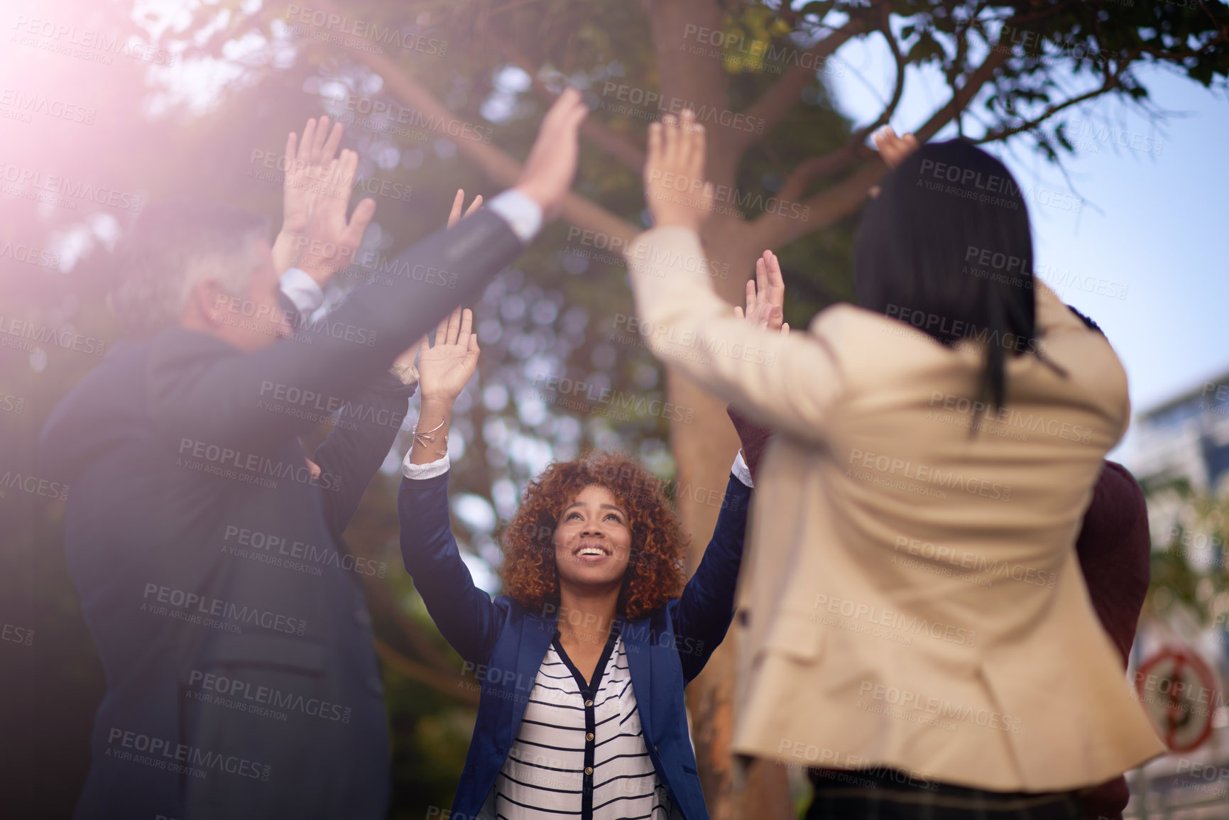 Buy stock photo Business people, high five and success with collaboration, team building and trees in city or street. Group, achievement and diversity with men, women and support or company with global partnership