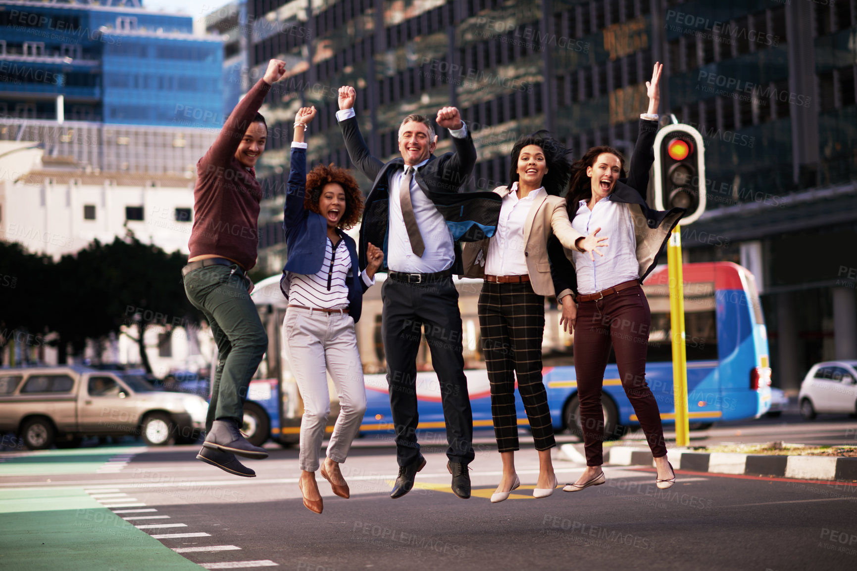 Buy stock photo Happy, business people and jumping in row for celebration, or success on urban street for meeting target. Diverse, corporate group and team building with energy and excitement for work achievement