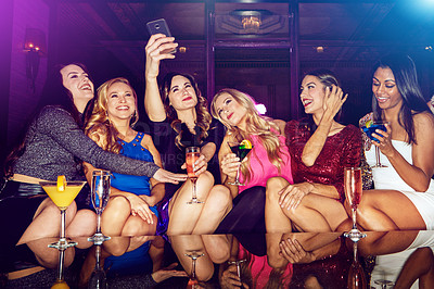 Buy stock photo Selfie, club and women with drinks at a party for new year, birthday or festive celebration. Fun, social and friends taking picture on a phone while drinking alcohol beverage in nightclub together.