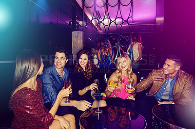 Buy stock photo Friends, neon club or party with alcohol drinks, cocktails and toast glass to celebrate birthday, new years and happy hour at VIP lounge. Social, celebration and nightclub with men and women cheers