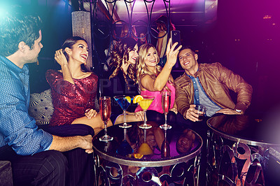 Buy stock photo Group selfie, vip or friends in nightclub with cocktails, smile or drinks for memory, event or reunion. Pictures, men or happy women on dark party couch for alcohol, photograph or social celebration