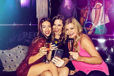 Buy stock photo Group selfie, girls or friends in nightclub with cocktails, smile or drinks for memory, event or reunion. Pictures, vip or happy women on dark party couch for alcohol, photo or social celebration