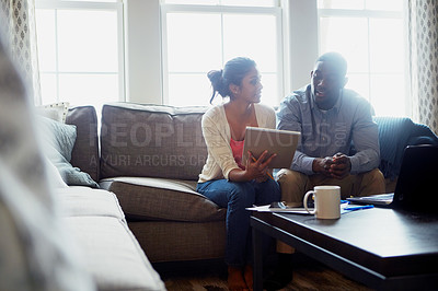 Buy stock photo Notebook, writing and couple on sofa in planning with notes, rent and payments for tax in living room. House, technology and people with sunlight on couch, cover and debt with finance for mortgage.