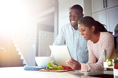 Buy stock photo Couple, tablet and cooking in kitchen for salad, online recipe and vegetables for nutrition dinner. People, marriage and ingredients for food in home, bonding and meal prep website for instructions