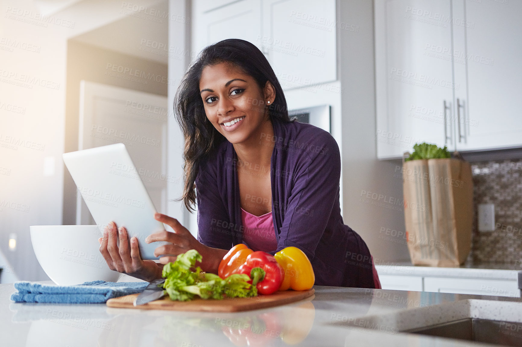 Buy stock photo Portrait, vegetables and woman with tablet in kitchen for online, instructions and recipe for cooking food. Home, person and ingredient with technology for meal prep, digital information and dinner