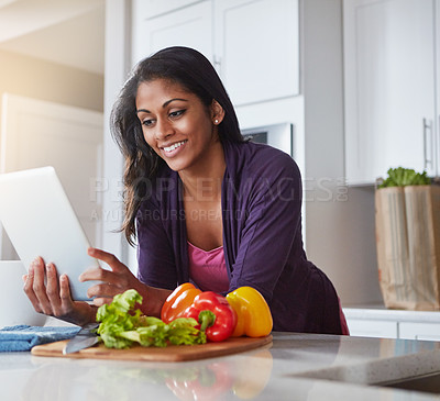 Buy stock photo Happy, woman and vegetables with tablet in kitchen for recipe, website or instructions of meal prep. Internet, person and ingredient with tech at home for dinner, cooking and information of food