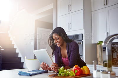 Buy stock photo Food, ingredients and woman with tablet in kitchen for help, information and internet recipe for dinner. Happy, person and vegetables with tech at home for meal prep, online instructions and cooking