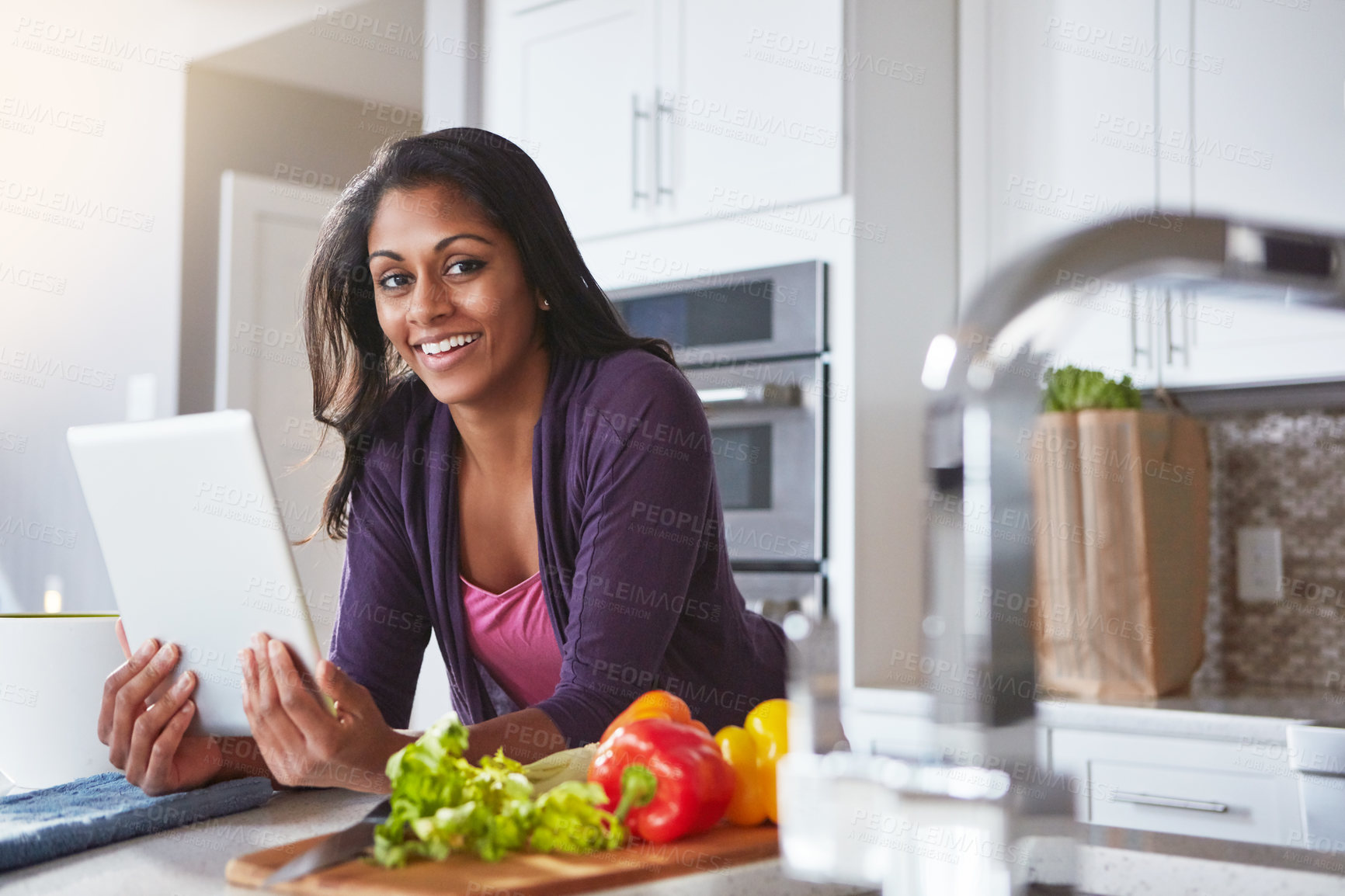 Buy stock photo Smile, portrait and woman with tablet in kitchen for website, instructions or recipe for cooking food. Online, person and ingredient with tech at home for vegetables, digital information and dinner