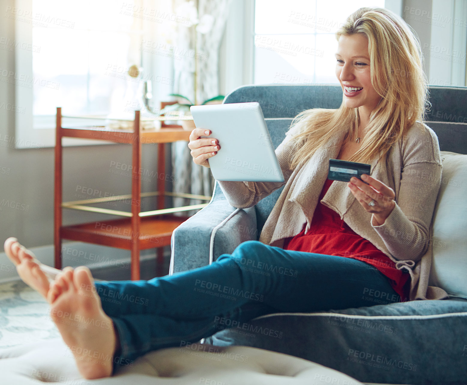 Buy stock photo Woman, banking card and tablet or happy on couch, fintech and online transaction for shopping in house. Customer, internet payment and sale or credit app, e commerce and relax or apartment purchase