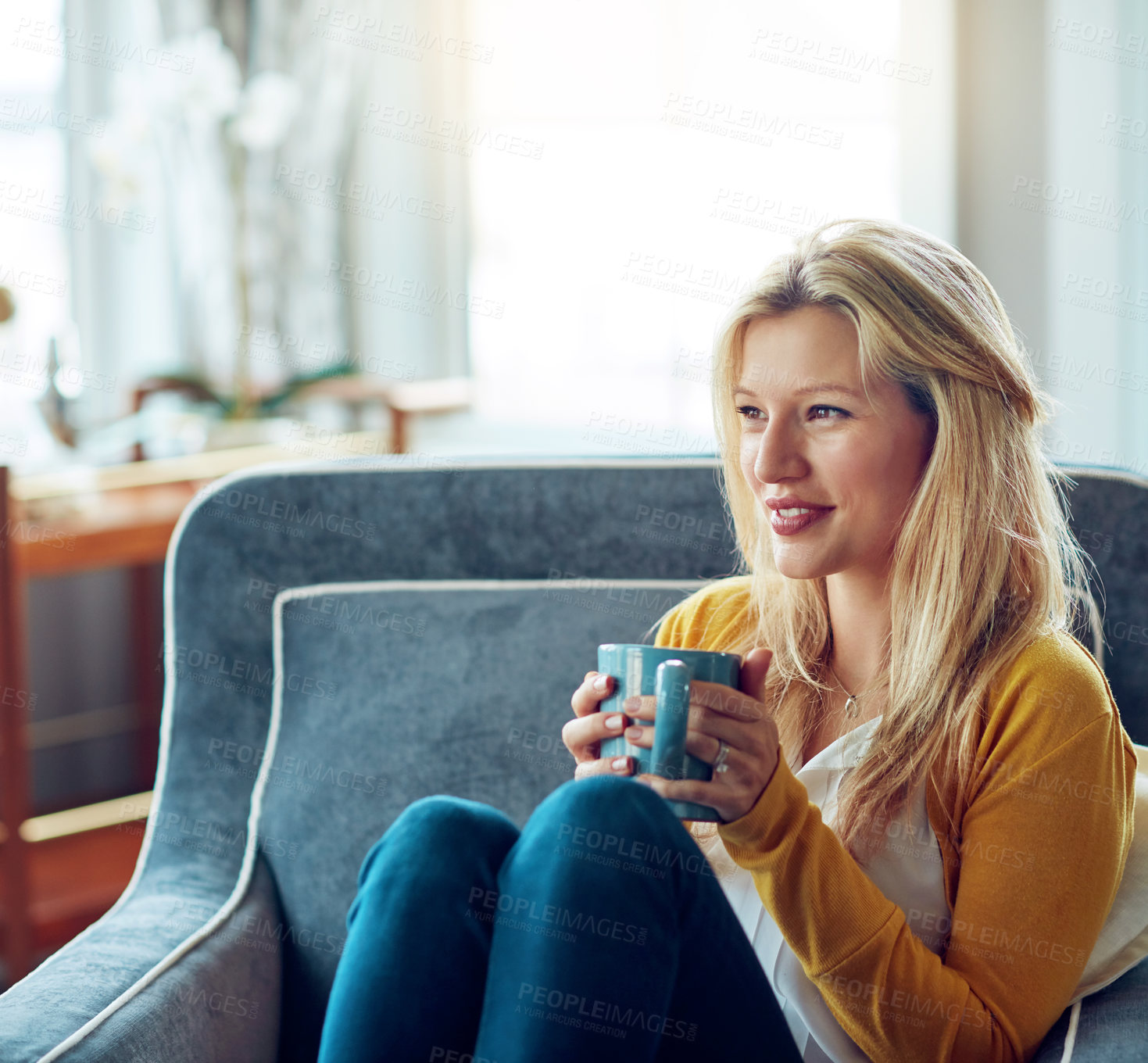 Buy stock photo Home, thinking and woman with coffee, lounge and relax in weekend, daydreaming and break in sofa. House, couch and person with tea, peace and smile for rest in living room, drink and happiness