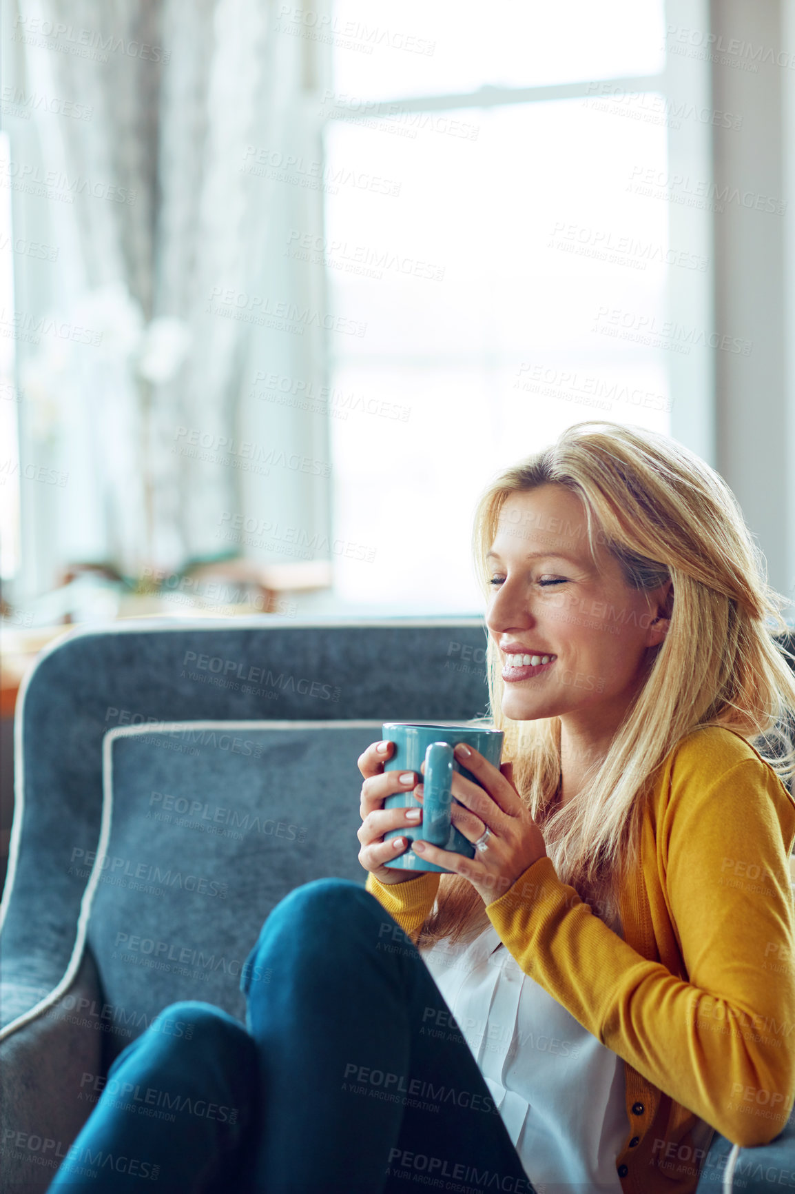 Buy stock photo Smile, coffee and woman on sofa in home for relaxing, chill and calm with drink, beverage and cappuccino. Happy, morning and person with cup, tea and mug in living room for wellness, rest and break