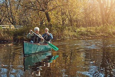 Buy stock photo Senior couple, kayak and rowing for holiday, travel or summer vacation in water outdoor together in river. Man, woman and canoe boat in lake on transport for adventure, exercise and happy in nature